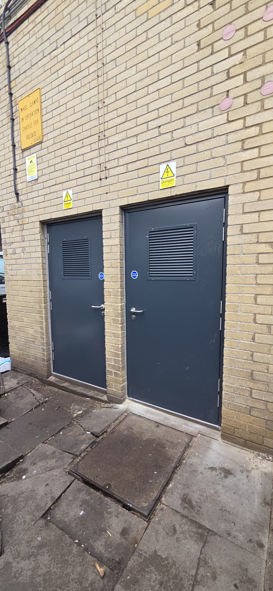 Fire-rated louvred steel doorsets with certified air transfer grilles installed to an external plant enclosure